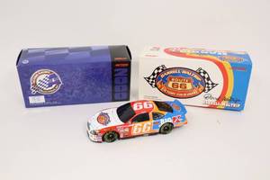 lot 207 image: Action Racing 124 NASCAR Diecast Car BANK...