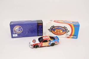 lot 209 image: Action Racing 124 NASCAR Diecast Car BANK...