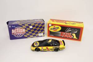 lot 218 image: #1 124 Action Racing NASCAR Die-Cast Car BANK...