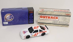 lot 296 image: Jeff Gordon #67 Outback Steakhouse 124 Action Racing NASCAR Die-Cast Car BANK...