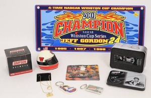 lot 312 image: John Force Castrol GTX Elvis 25th Anniv. 2002 Mustang Funny Car 164 Autograph, Gold Necklace #30, Jeff Gordon #24 DuPont 2001 CHAMPION Plastic WinCraft License Plate Winston Cup NEW, Simpson Mini Helmet Limited First Edition() Red Dog wBox...