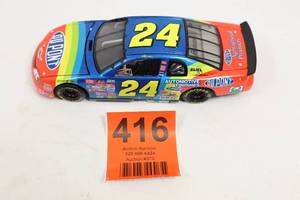 lot 416 image: 1999 Jeff Gordon #24 DuPont NASCAR Diecast 124