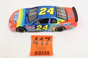 lot 417 image: 1999 Jeff Gordon #24 DuPont NASCAR Diecast 124