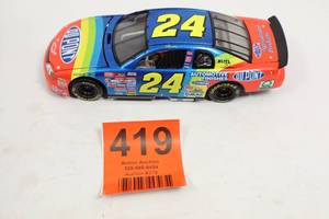 lot 419 image: 1999 Jeff Gordon #24 DuPont NASCAR Diecast 124