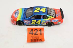 lot 421 image: 1999 Jeff Gordon #24 DuPont NASCAR Diecast 124