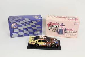 lot 482 image: Sterling Marlin #40 John Wayne 1999 Chevy Monte Carlo  1999 Action  Lionel ARC 124