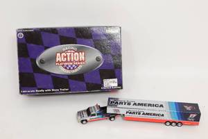 lot 499 image: Darrell Waltrip  1997 Parts America Chrome 164 Chevy Dually and Trailer