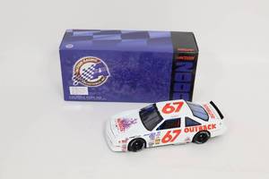 lot 523 image: Action 124 Scale Jeff Gordon #67 Outback Steakhouse Diecast Stock Car