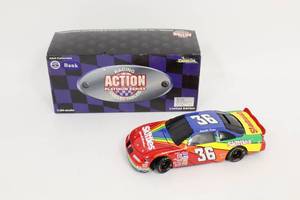 lot 525 image: Derrick Cope #36 Skittles 1997 NASCAR Pontiac Grand Prix Action Diecast 124