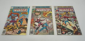 lot 43 image: (3) 1970s Marvel Comics The Invaders #14 #23 #25 Scarlet Scarab Comic Books...