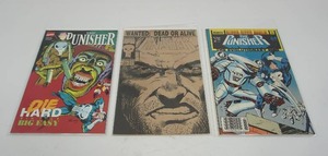 lot 101 image: (3) Marvel Comic Books The Punisher #57 Wanted Dead or Alive 1991, Die Hard in the Big Easy (1992) Punisher vs Zombies, Super-Sized Annual #1 The Evolutionary War...