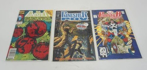 lot 103 image: (3) Marvel Comic Books The Punisher Holiday Special #1, The Punisher 2099 #1 FEB 1993, P.O.V. #2 Nick Fury Graphic Novels...