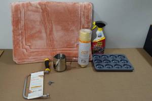 lot 288 image: Rug, Doughnut Pan, Drying Cloth, Goo-Gone, Etc