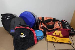 lot 315 image: Assorted Bags -Vexilar Case, Nike Duffel, Kawasaki Backpack