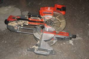 lot 27 image: Milwaukee Fuel 10 Fuel Brushless Dual Bevel Cordless Compound Sliding Miter Saw