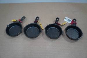 lot 123 image: 4 Lodge Cast Iron #2 Skillets