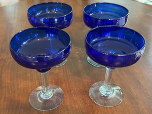 lot 29 image: Four Blue Hand Blown Margarita Glasses
