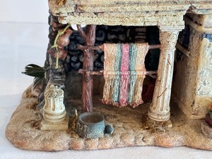 lot 75 image: Department 56 Little Town of Bethlehem Series Rug Merchants Colonnade