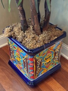 lot 15 image: Mexican Pottery Planter with Large Faux Tropical Plant