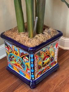 lot 20 image: Mexican Pottery Planter with Large Faux Heliconia Plant