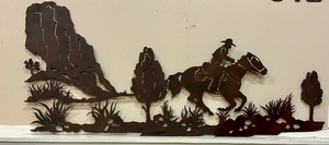 lot 114 image: Metal Laser Cut Cowboy Southwest Wall Hanging