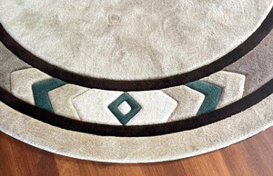 lot 28 image: Southwestern Design Round Area Rug