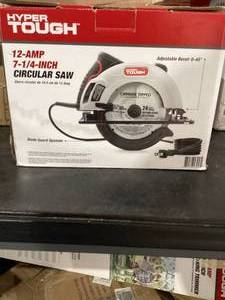 lot 256 image: Hyper Tough 12 Amp Corded 7-14 Circular Saw with Steel Plate