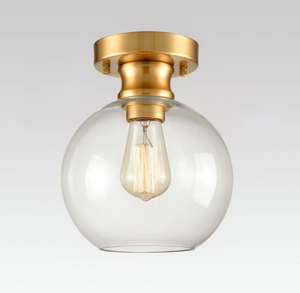 lot 578 image: Gold Ceiling Light Fixture Flush Mount with Globe Clear Glass Shade