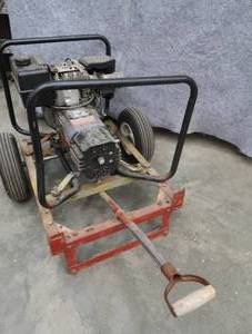 lot 4 image: HOMELITE 4400 WATTS GENERATOR. ON WHEELS