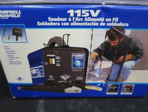 lot 6 image: NIB  115V ARC WELDER