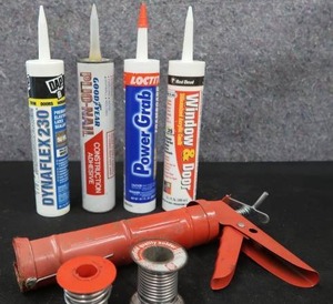 lot 98 image: SODER  CAULK GUN CAULK