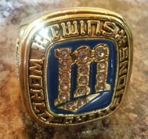 lot 41 image: Minnesota Twins 1987 World Series Replica Ring.