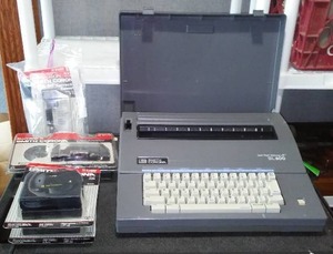 lot 315 image: Smith Corona Typewriter and Ribbon.