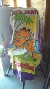 lot 347 image: Garfield Beach Towel And Misc. Household.