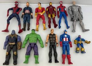 lot 30 image: Large Group Of 12 Superhero Action Figures & More