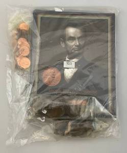 lot 93 image: Lincoln Historic Beginning Coin Collection Books With Unsorted Coins
