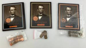 lot 106 image: Lincoln Historic Beginning Coin Collection Books With Unsorted Coins
