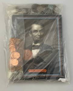 lot 107 image: Lincoln Historic Beginning Coin Collection Books With Unsorted Coins