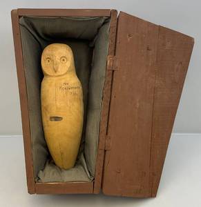 lot 248 image: 1971 Headshrinker Owl In Wooden Coffin With Writing
