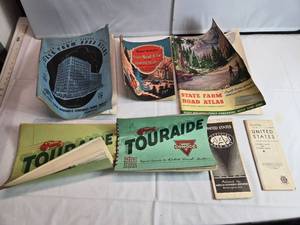 lot 80 image: Vintage Road Atlas and Tour Guide Collection Featuring Conoco Touraide, State Farm, and Rand McNally