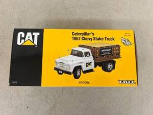 lot 312 image: Caterpillars 1957 Chevy Stake Truck 125 Scale