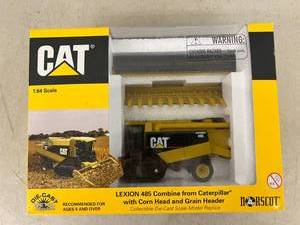 lot 313 image: CAT Lexion 485 Combine with Corn Head & Grain Header