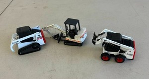 lot 447 image: Bobcat Metal Toys