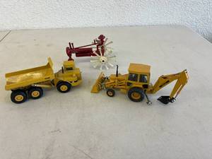 lot 450 image: John Deere, Cat & Unique Farmall Handmade Toys