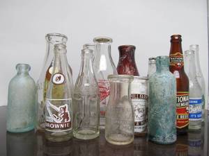 lot 112 image: Large Group of Vintage & Antique Advertising Bottles - Dairy Soda Beer etc