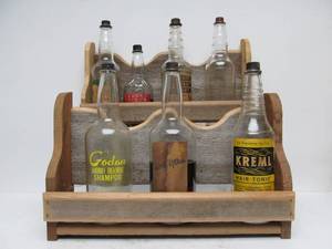 lot 214 image: Vintage Barber Shop Salon Style Display Rack wOld Advertising Bottles