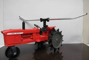 lot 72 image: Excellent Large Vintage Cast Iron Tractor Sprinkler - 4010 Gilmour Tractor