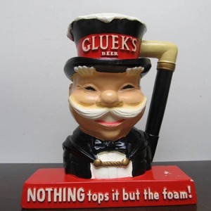lot 78 image: Original Vintage 1960s GLUEKS Chalkware Beer Advertising Display - Man in Tophat