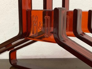 lot 392 image: 3 Mid Century Red LuciteAcrylic Clothes Hangers