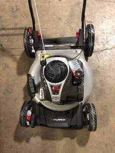 Murray 21 in. 140 cc Briggs and Stratton Walk Behind Gas Push Lawn Mower with Height Adjustment and Prime N Pull Start in working Conditions Customer Returns See Pictures